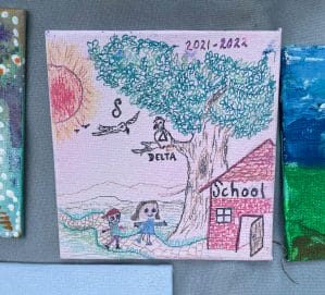 Square canvas featuring an illustration of a red school building with two children walking toward it. There is a large tree behind the school with a bird in the branch. The word "Delta" is written under the bird. There is another bird flying with a music note above its head, and the sun is shining.